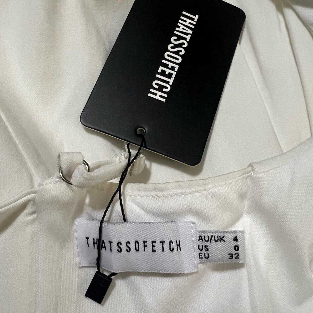 Chic White Sleeveless Mini Dress - Picture 10 of 16